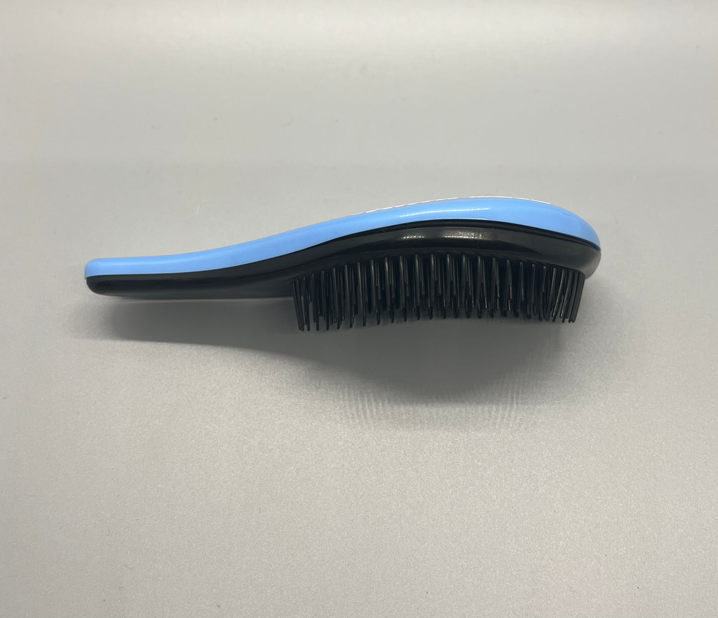 Shampooing brush